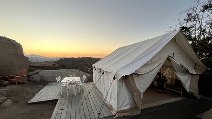 Romantic Mountain Tented Cabin with Spacious Interior and Spectacular Sunsets in California - glamping.directory