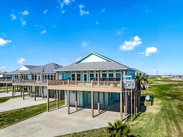 Delightful Beach House with Yard and Deck for Coastal Getaway on Crystal Beach, Texas - glamping.directory