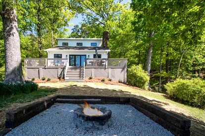 Embrace Nature in this Lakefront Cottage with Fire Pit in Charlotte, North Carolina - glamping.directory