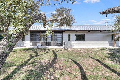 Stylish Waterfront Vacation Rental with Boat Dock and Golf Course in Rockport, Texas - glamping.directory