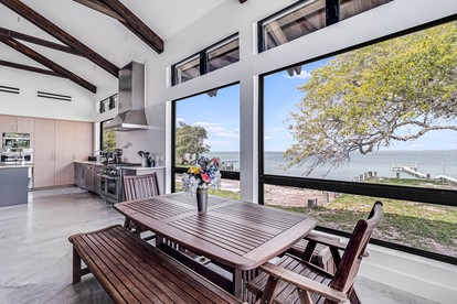 Stylish Waterfront Vacation Rental with Boat Dock and Golf Course in Rockport, Texas - Rockport, Texas - glamping.directory