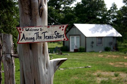 Romantic Rustic Cabin with Hot Tub on Working Ranch in Fredericksburg, Texas - Fredericksburg, Texas - glamping.directory