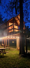 Tree House Glamping Destination near the Ozarks, with River Access for Swimming and Fishing - Eureka Springs, Arkansas - glamping.directory