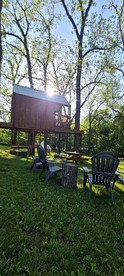 Tree House Glamping Destination near the Ozarks, with River Access for Swimming and Fishing - Eureka Springs, Arkansas - glamping.directory