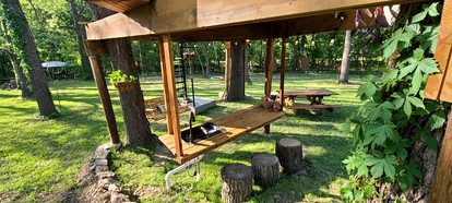 Tree House Glamping Destination near the Ozarks, with River Access for Swimming and Fishing - Eureka Springs, Arkansas - glamping.directory