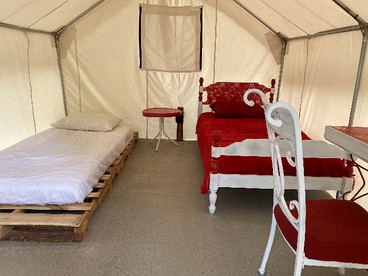 Glamping Escape in Sturgis, South Dakota, in Lovely Safari Tent Rental for Two - Sturgis, South Dakota - glamping.directory