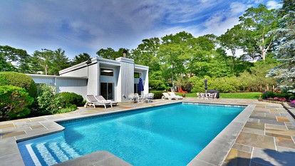 Incredible Villa Rental with a Hot Tub, a Swimming Pool, and Tennis Courts in the Hamptons, New York - glamping.directory