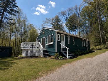 Cozy Lakeside Cabin Retreat with Scenic Views for a Relaxing Getaway in Greenville, Maine - glamping.directory