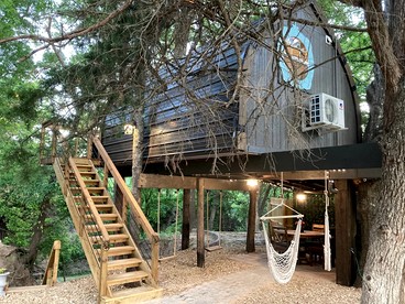Magical Treehouse Retreat with Creek Views near Forestburg Forest in Forestburg, Texas - Forestburg, Texas - glamping.directory