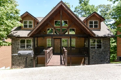 Spacious Cabin with Indoor and Outdoor Swimming Pool in Branson, Missouri - glamping.directory