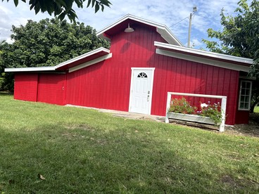 Beautiful Red Cottage for a Relaxing Getaway on a Tropical Fruit Farm near Homestead, Florida - glamping.directory