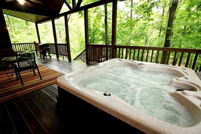 Romantic Cabin Getaway for Two with Hot Tub, Pond & Western Charm in Beavers Bend - Broken Bow, Oklahoma - glamping.directory
