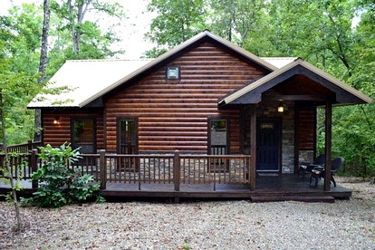 Romantic Cabin Getaway for Two with Hot Tub, Pond & Western Charm in Beavers Bend - glamping.directory