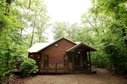 Romantic Cabin Getaway for Two with Hot Tub, Pond & Western Charm in Beavers Bend - Broken Bow, Oklahoma - glamping.directory