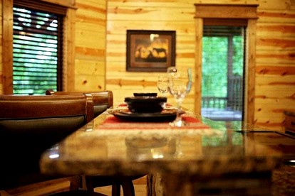 Romantic Cabin Getaway for Two with Hot Tub, Pond & Western Charm in Beavers Bend - Broken Bow, Oklahoma - glamping.directory
