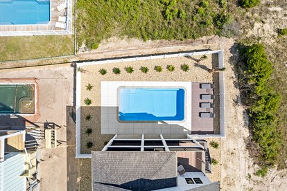 Stylish Family Beach House with Outdoor Pool and Beach Access in Holden Beach, North Carolina - Holden Beach, North Carolina - glamping.directory