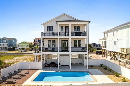 Stylish Family Beach House with Outdoor Pool and Beach Access in Holden Beach, North Carolina - glamping.directory