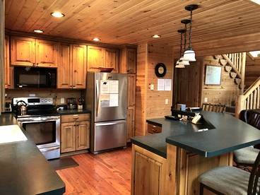 Rustic Family Cabin Nestled Among the Towering Trees in Idaho - Island Park, Idaho - glamping.directory