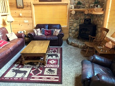 Rustic Family Cabin Nestled Among the Towering Trees in Idaho - Island Park, Idaho - glamping.directory