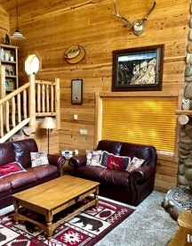 Rustic Family Cabin Nestled Among the Towering Trees in Idaho - Island Park, Idaho - glamping.directory