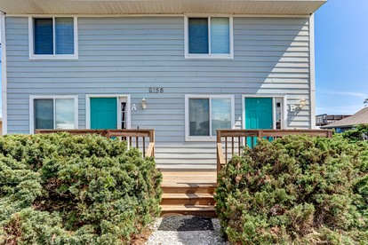 Delightful Beachfront Duplex with Shared Deck and Ocean Views in Fernandina Beach, Florida - glamping.directory