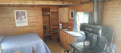 Rustic Glamping Cabin near Poudre River, Perfect for a Weekend of Fishing and Watching Wildlife - Bellvue, Colorado - glamping.directory