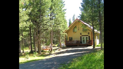 Peaceful Family-Friendly Cabin with Game Loft Near Old Faithful in Island Park, Idaho - glamping.directory