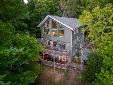 Luxury Mountain Retreat with Hot Tub, Game Room, and Two Scenic Decks in Helen, Georgia - glamping.directory