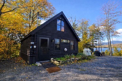 Secluded Lakefront Hideaway with Dock, Fire Pit & Forest Views in Greenville, Maine - glamping.directory