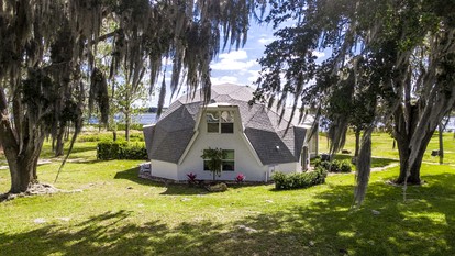 Modern 3-Bedroom Lakefront Home with Pool, Patio & Private Helipad in Clermont, Florida - Clermont, Florida - glamping.directory