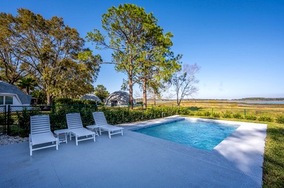 Modern 3-Bedroom Lakefront Home with Pool, Patio & Private Helipad in Clermont, Florida - Clermont, Florida - glamping.directory