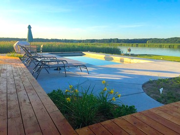 Elegant Waterfront Vacation Rental with a Pool and Spa near Saugatuck, Michigan - glamping.directory