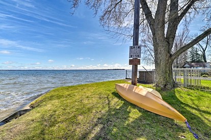 Lakefront Cottage with Fire Pit, Beach & Pet Friendly in Houghton Lake, Michigan - Houghton Lake, Michigan - glamping.directory