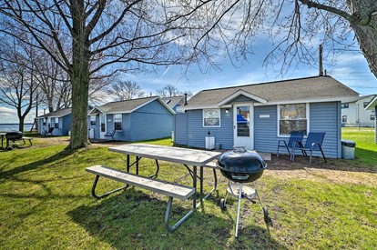 Lakefront Cottage with Fire Pit, Beach & Pet Friendly in Houghton Lake, Michigan - glamping.directory