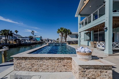 Stylish Waterfront Getaway with Private Dock, Pool, and Game Room near Rockport Beach, Texas - Rockport, Texas - glamping.directory