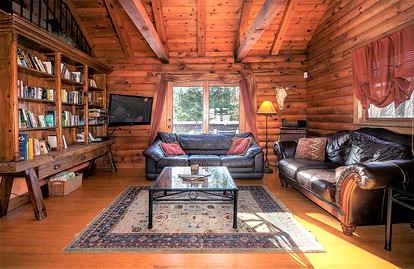 Log Cabin with a Hot Tub in Ellicottville, For Magical Glamping Escapes in New York - glamping.directory