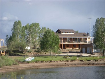 Luxury, Waterfront Cabin with Private Hot Tub on Lake DeWeese Wildlife Refuge in Colorado - Westcliffe, Colorado - glamping.directory