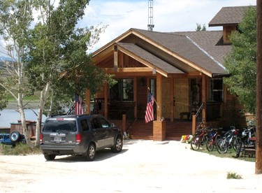 Luxury, Waterfront Cabin with Private Hot Tub on Lake DeWeese Wildlife Refuge in Colorado - glamping.directory