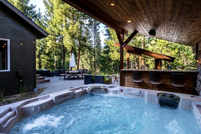 Panoramic Views of the Chiwawa River from a Luxury Cabin Porch with Private Hot-Tub in Leavenworth - Leavenworth, Washington - glamping.directory