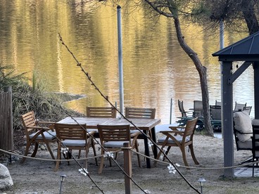 Tranquil Waterfront Hideaway with Forest Views & Outdoor Living in Bass Lake, California - glamping.directory