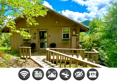 Secluded Cabin with Hot-Tub and River Views in Tennessee - glamping.directory