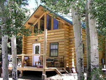 Authentic Log Cabin Rental with Wood from the San Juan Forest near Lake City Ski Hill, Colorado - Lake City, Colorado - glamping.directory