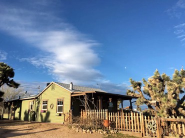 Rustic Cabin Rental Surrounded by the Mojave Desert in Yucca Valley, California - glamping.directory