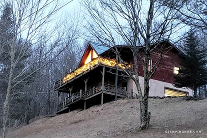Spacious Log Cabin Rental for Ten with Breathtaking Views near Asheville - glamping.directory