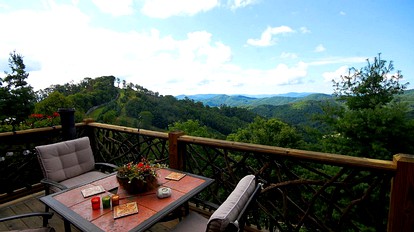 Spacious Log Cabin Rental for Ten with Breathtaking Views near Asheville - North Hill, North Carolina - glamping.directory