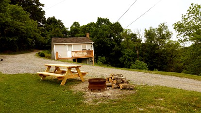 Secluded Cabin Rental in a Rural Setting near the Hatfield-McCoy Trails of West Virginia - Rock, West Virginia - glamping.directory