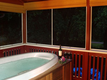Elevated Riverfront Cabin with Hot Tub and Lanai on Kauai, Hawaii - Hanalei, Hawaii - glamping.directory