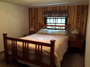 Waterfront Getaway Cabin with a Fire Pit on Raquette Lake, New York - Raquette Lake, New York - glamping.directory