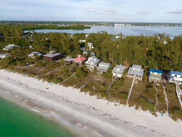 Incredible Beach Front Cottage with Gorgeous Sea Views for a Peaceful Escape on Little Gasparilla Island, Florida - Placida, Florida - glamping.directory