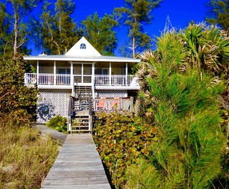 Incredible Beach Front Cottage with Gorgeous Sea Views for a Peaceful Escape on Little Gasparilla Island, Florida - glamping.directory